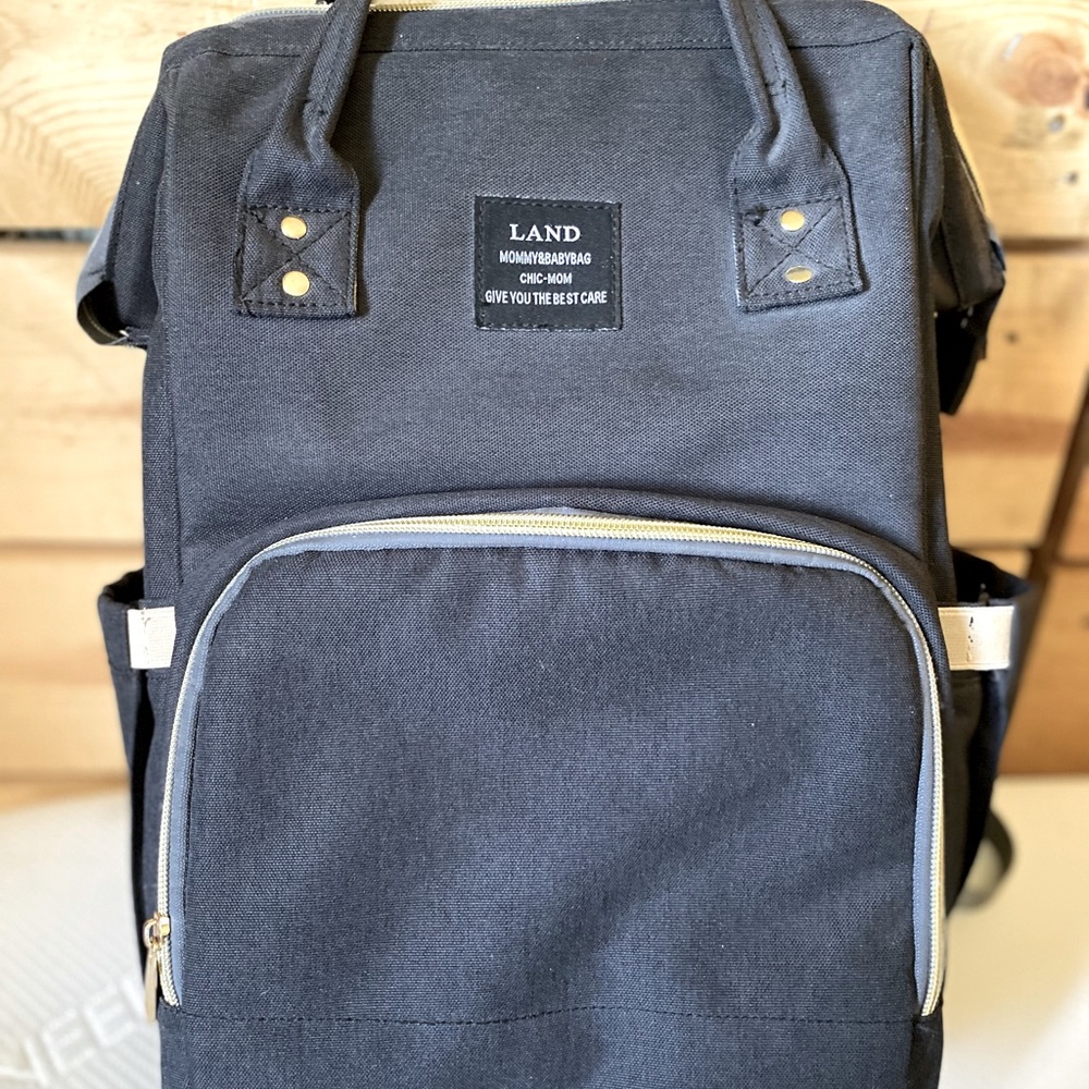 Land diaper bag for mom and baby. Super cute!!